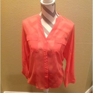 Candie’s sheer coral blouse